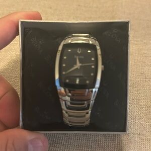 Bulova square face dress watch.